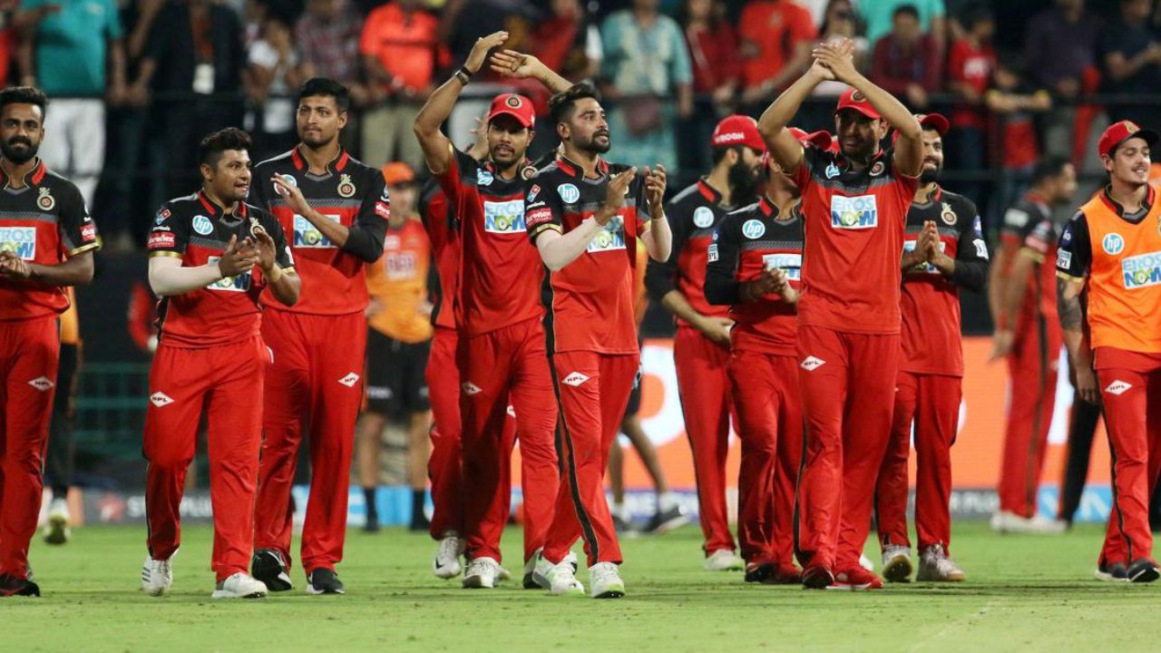 RCB TEAM ENJOYING AND CELEBRATING IN GROUND IN THEIR JERSEY