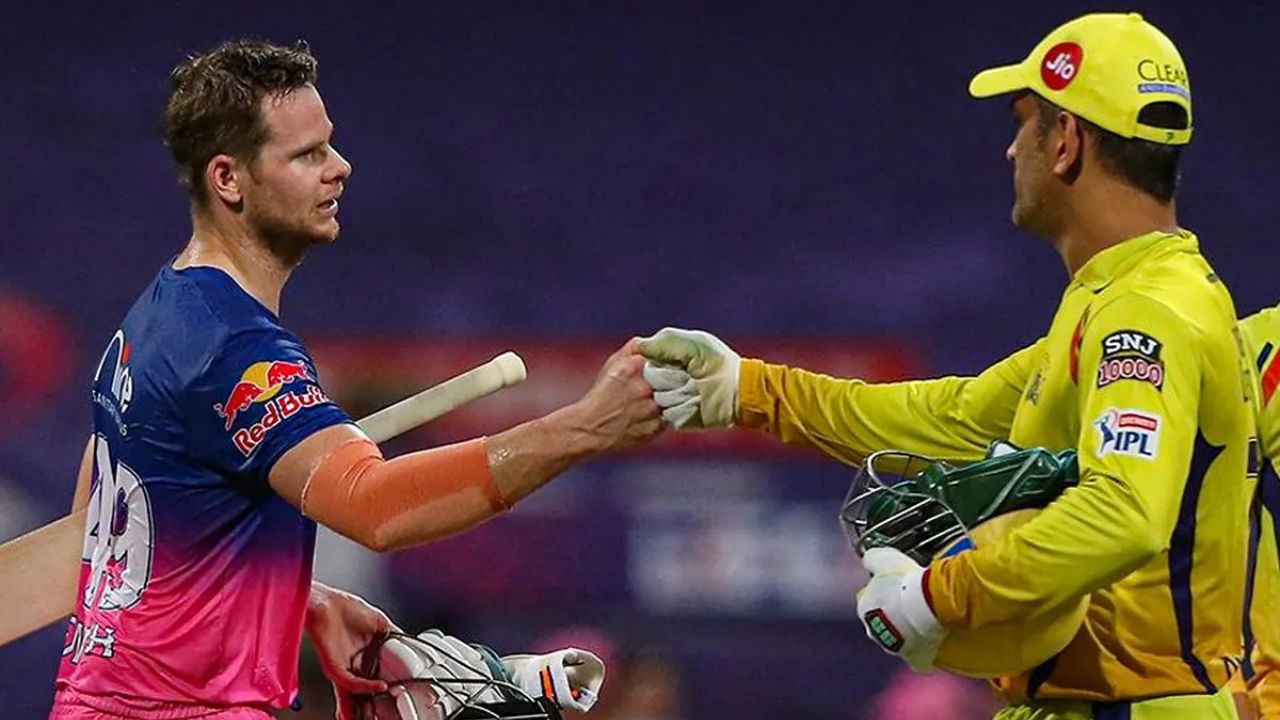 dhoni and smith and in one frame dhoni wearing csk jersey and smith in rajasthan jersey in ground